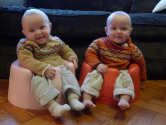 Enjoying a new view point in their bumbo seats
